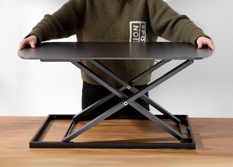 Ultra Slim Standing Desk Erhöhung | Fit mit unseren ergonomische Produkten am Arbeitsplatz | Worktrainer.de