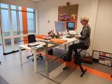 Sitz-steh Schreibtisch mit Deskbike von Worktrainer